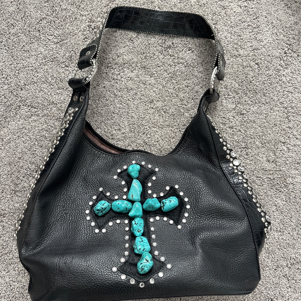 Turquoise cowhide cross detail bag